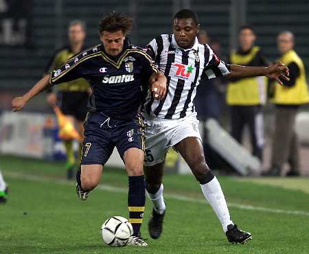 Juventus' Zalayeta in Action With Parma's Sartor During Italian Cup Soccer Match