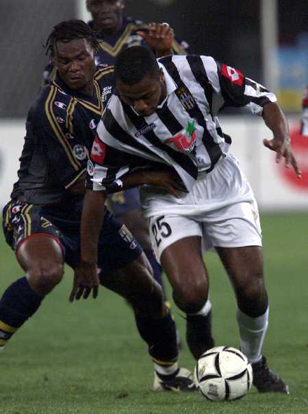 Juventus' Zalayeta Challenges Parma's Djetou During Italian Cup Soccer Match